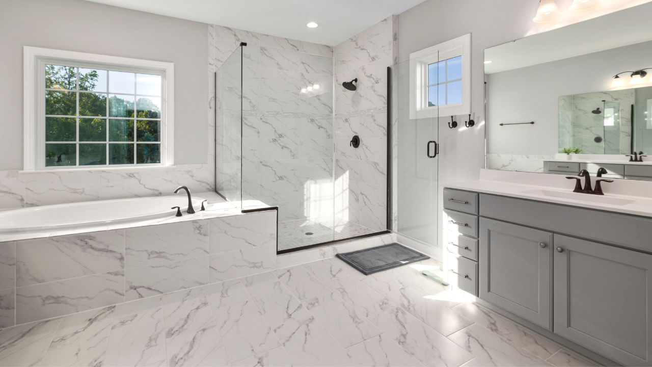 Natural stone marble countertop and tile in a Vancouver WA bathroom